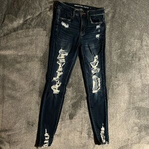 dark blue ripped skinny jeans